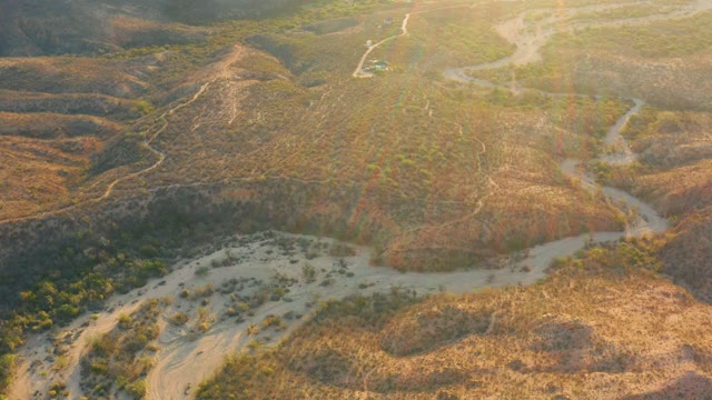CABO PULMO BCS MEXICO-2021: Arid Hills and Winding River in Golden Light
