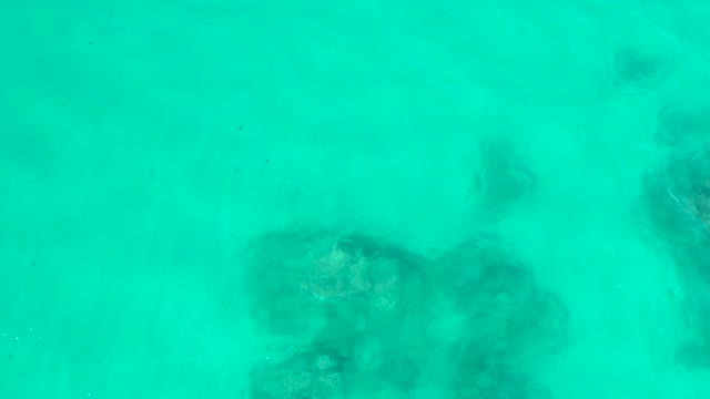 HILTON LOS CABOS MEXICO-2021: Clear Turquoise Water Revealing Submerged Rocks