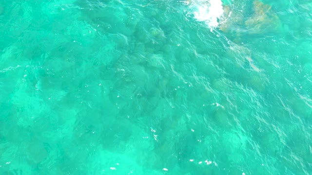 HILTON LOS CABOS MEXICO-2021: Overhead View of Clear Turquoise Water and Underwater Rocks