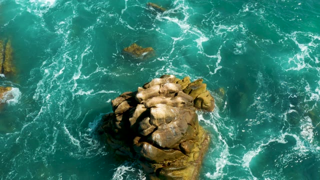 HILTON LOS CABOS MEXICO-2021: Rock Formation in Turquoise Ocean Water with Moving Waves