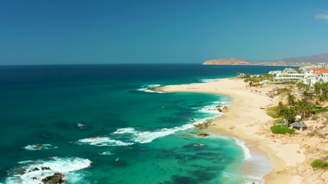 HILTON LOS CABOS MEXICO-2021: Waves Receding From Sandy Shoreline