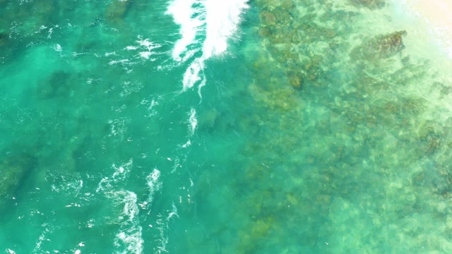 HILTON LOS CABOS MEXICO-2021: Shallow Ocean Waves Breaking Over Rocky Seabed