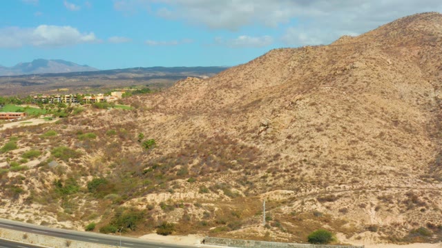 HILTON LOS CABOS MEXICO-2021: Arid Hills and Highway in a Dry Landscape