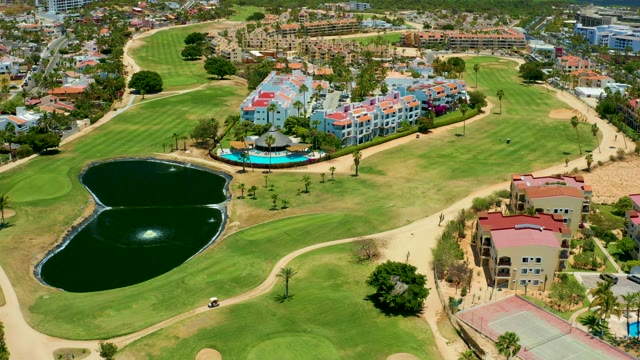 SAN JOSE DEL CABO BCS MEXICO-2021: Golf Course with Moving Cart and Pool Activity