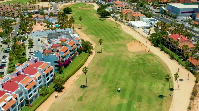 SAN JOSE DEL CABO BCS MEXICO-2021: Golf Course with Buildings and Golf Carts