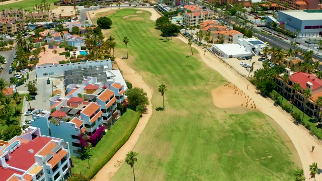 SAN JOSE DEL CABO BCS MEXICO-2021: Golf Course with Residential Buildings and Tent Activity