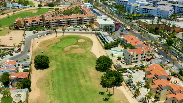 SAN JOSE DEL CABO BCS MEXICO-2021: Golf Course and Urban Roads with Moving Traffic