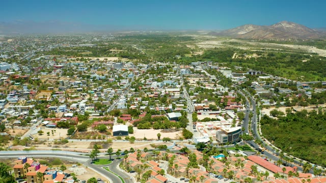 SAN JOSE DEL CABO BCS MEXICO-2021: Residential Neighborhood with Building Construction and Traffic