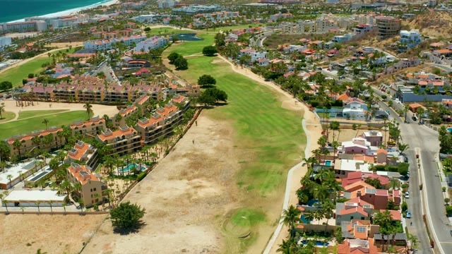 SAN JOSE DEL CABO BCS MEXICO-2021: Coastal Golf Course and Residential Area with Moving Car