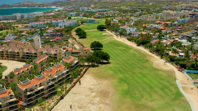 SAN JOSE DEL CABO BCS MEXICO-2021: Golfer Moving Across Coastal Golf Course