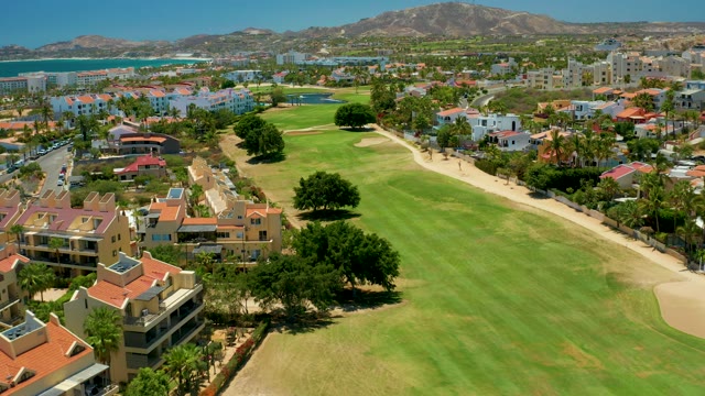 SAN JOSE DEL CABO BCS MEXICO-2021: Aerial Pan of Golf Course and Residential Buildings
