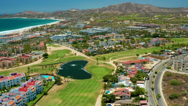 SAN JOSE DEL CABO BCS MEXICO-2021: Coastal Golf Course with Moving Car and Grass Color Change