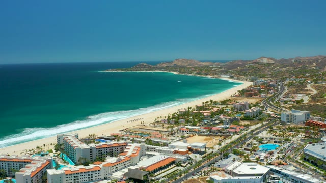 SAN JOSE DEL CABO BCS MEXICO-2021: Beachside Highway with Vehicles Moving Along Coast