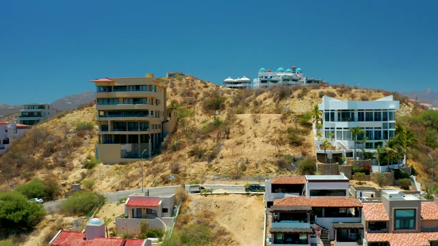 SAN JOSE DEL CABO BCS MEXICO-2021: Hillside with Modern Houses and Dry Landscape