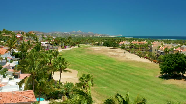SAN JOSE DEL CABO BCS MEXICO-2021: Person Walking on Golf Course From Aerial Perspective