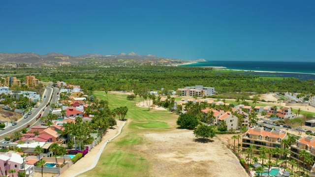 SAN JOSE DEL CABO BCS MEXICO-2021: Coastal Residential Area with Golf Course and Road Traffic