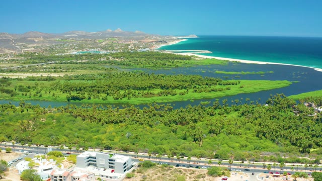 SAN JOSE DEL CABO BCS MEXICO-2021: Wetland Estuary with Coastal Road and Ocean View