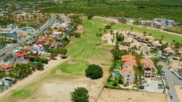SAN JOSE DEL CABO BCS MEXICO-2021: Golf Course and Residential Area with Highway Traffic