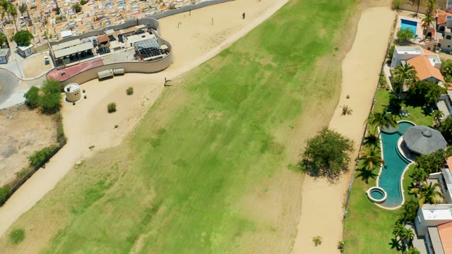 SAN JOSE DEL CABO BCS MEXICO-2021: Residential Neighborhood with Green Field and Sandy Paths