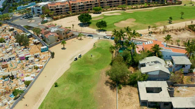 SAN JOSE DEL CABO BCS MEXICO-2021: Golf Cart Moving Along a Path near a Golf Course