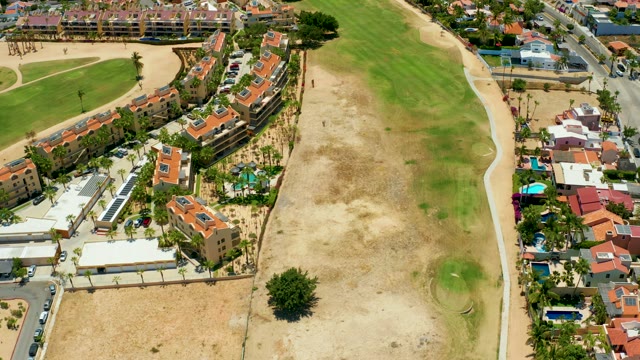 SAN JOSE DEL CABO BCS MEXICO-2021: Residential Area with Field and Moving People