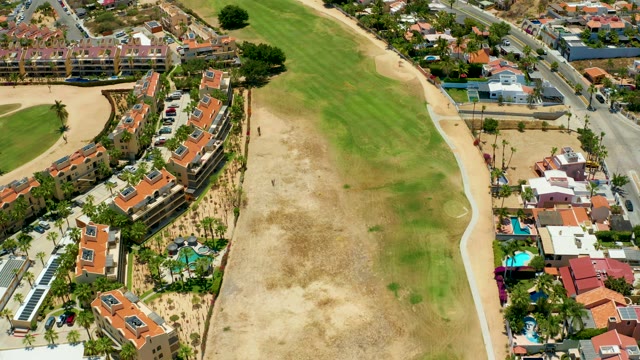 SAN JOSE DEL CABO BCS MEXICO-2021: Residential Buildings Surrounding a Large Grassy Field