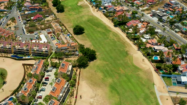SAN JOSE DEL CABO BCS MEXICO-2021: Residential Neighborhood with Golf Course and Moving Traffic