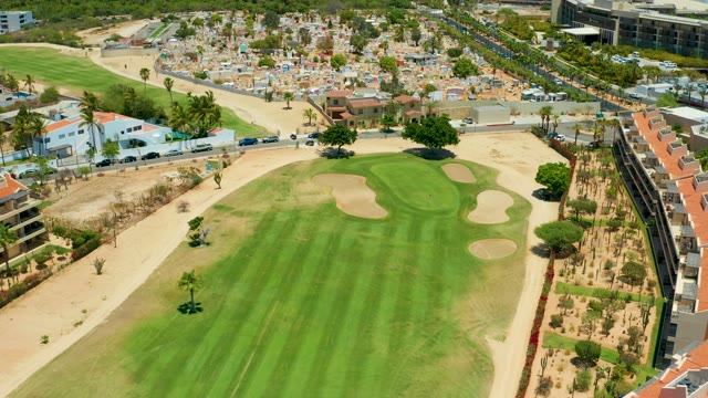 SAN JOSE DEL CABO BCS MEXICO-2021: Golf Course with Traffic on Surrounding Roads