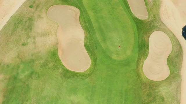 SAN JOSE DEL CABO BCS MEXICO-2021: Golf Ball Rolling Toward Hole From Above