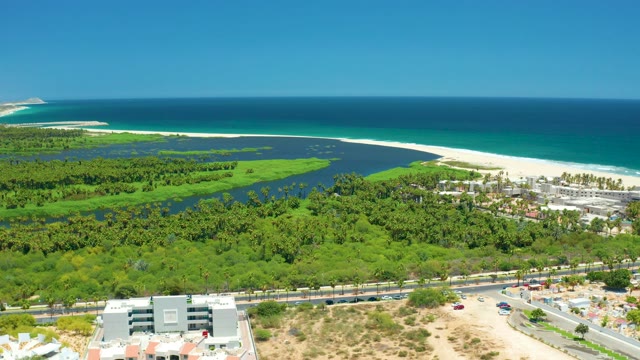 SAN JOSE DEL CABO BCS MEXICO-2021: Coastal Road and Buildings by the Ocean