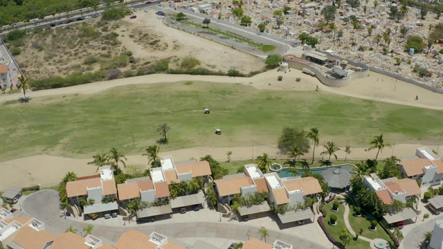 SAN JOSE DEL CABO BCS MEXICO-2021: Residential Neighborhood with Golf Course and Moving Traffic