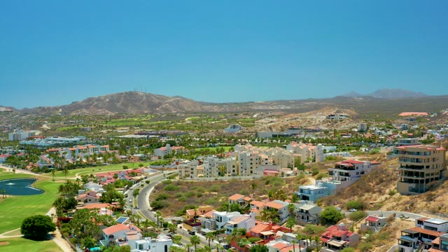 SAN JOSE DEL CABO BCS MEXICO-2021: Residential Area with Golf Course and Moving Car