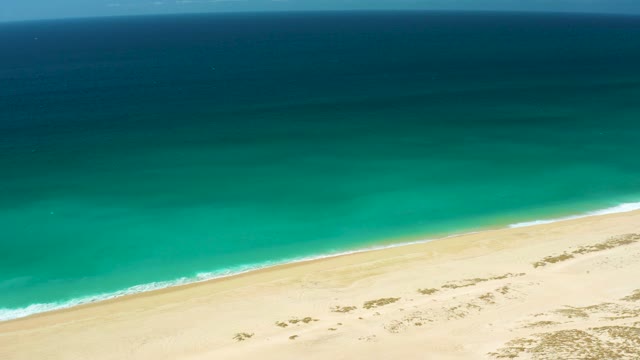 LA LAGUNA BEACH LOS CABOS MEXICO-2021: Sandy Shore and Turquoise Ocean From Above