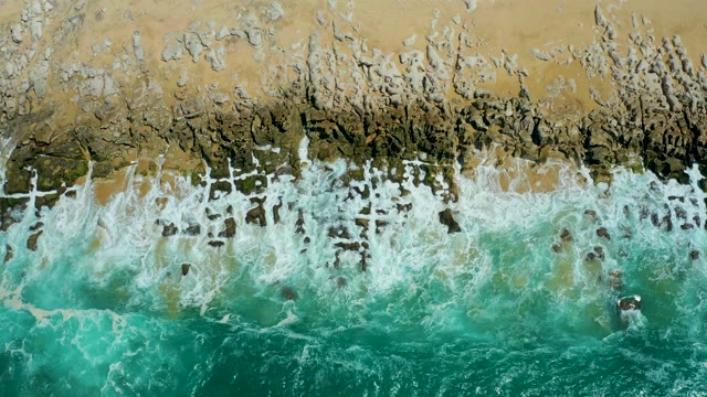 LA LAGUNA BEACH LOS CABOS MEXICO-2021: Waves Crashing on Sandy Shore Aerial