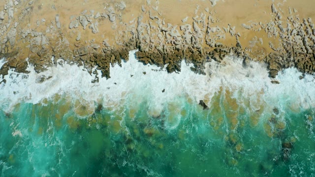 LA LAGUNA BEACH LOS CABOS MEXICO-2021: Waves Crashing on Sandy and Rocky Shore