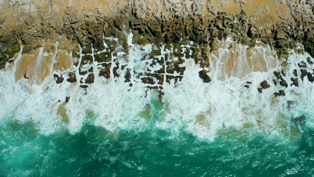 LA LAGUNA BEACH LOS CABOS MEXICO-2021: Waves Crashing on Rocky and Sandy Shore