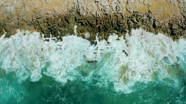 LA LAGUNA BEACH LOS CABOS MEXICO-2021: Waves Crashing on Rocky Beach From Above