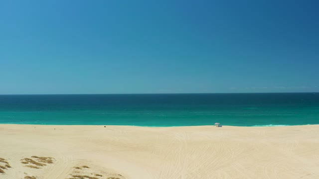 LA LAGUNA BEACH LOS CABOS MEXICO-2021: Beach with Shifting Sand and Turquoise Ocean