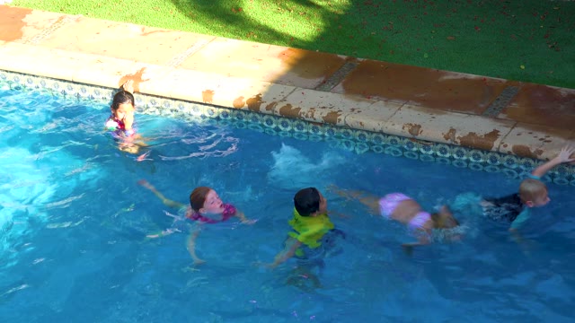 SAN JOSE DEL CABO BCS MEXICO-2020: Children Playing in a Swimming Pool