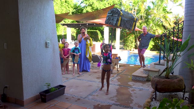 SAN JOSE DEL CABO BCS MEXICO-2020: Child Playing with Large Toy by Poolside