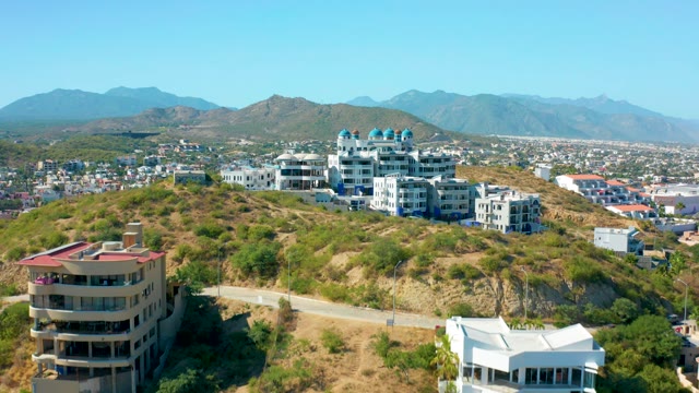 SAN JOSE DEL CABO MEXICO-2020: Panning View of Hillside Homes and Mountains
