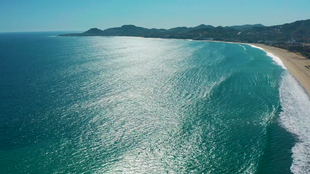 SAN JOSE DEL CABO MEXICO-2020: Ocean Waves Approaching Sandy Beach Coastline