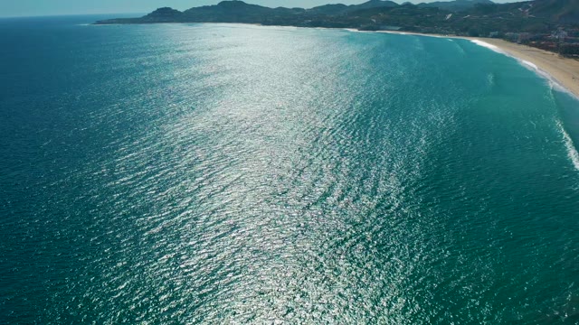 SAN JOSE DEL CABO MEXICO-2020: Ocean and Sandy Beach Along Mountainous Coast