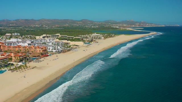 SAN JOSE DEL CABO MEXICO-2020: Coastal Resort Beach with Aerial Rightward Pan