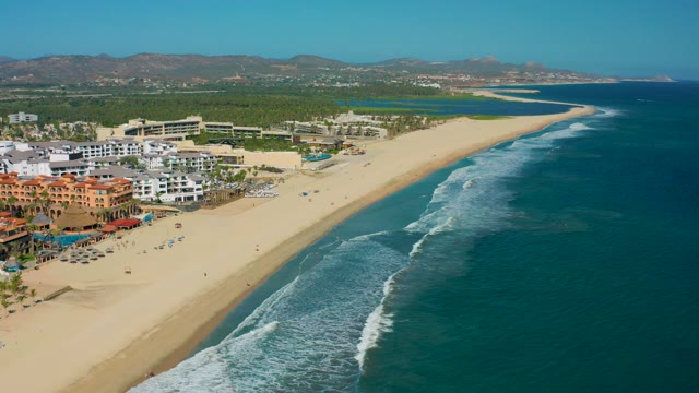 SAN JOSE DEL CABO MEXICO-2020: Waves Rolling In On Sandy Shoreline