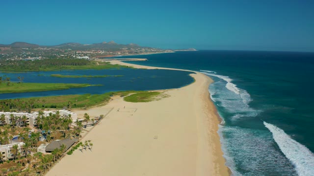 SAN JOSE DEL CABO MEXICO-2020: Sandy Beach with Lagoon and Gentle Ocean Waves