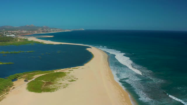 SAN JOSE DEL CABO MEXICO-2020: Coastal Sandbar with Lagoon and Ocean Waves