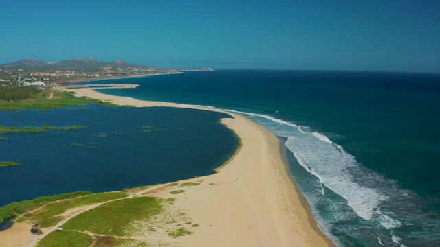 SAN JOSE DEL CABO MEXICO-2020: Coastal Sandbar with Lagoon and Ocean Waves