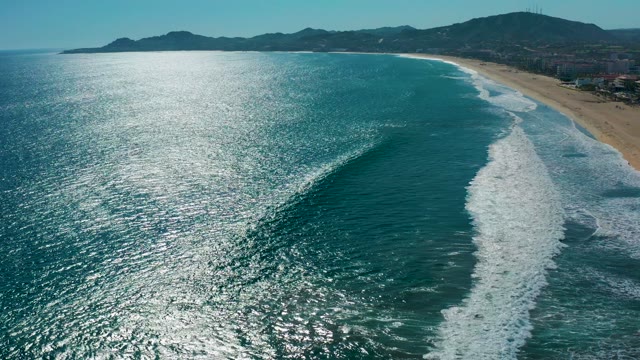 SAN JOSE DEL CABO MEXICO-2020: Ocean Wave Moving Toward Sandy Beach Shoreline