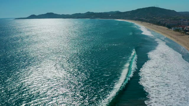 SAN JOSE DEL CABO MEXICO-2020: Ocean Waves Rolling Toward Sandy Beach